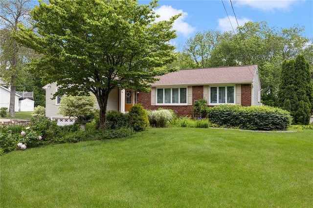 48 Nottingham Dr, Scituate, RI 02831 - view of front of property featuring brick siding and a front lawn