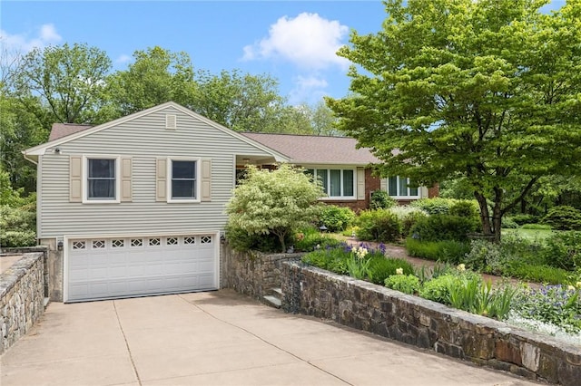 48 Nottingham Dr, Scituate, RI 02831 - view of front of property with driveway and an attached garage