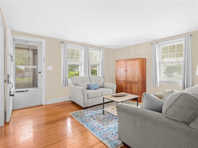 25 Community Rd, Warwick, RI 02889 - living room featuring light wood-style flooring and baseboards