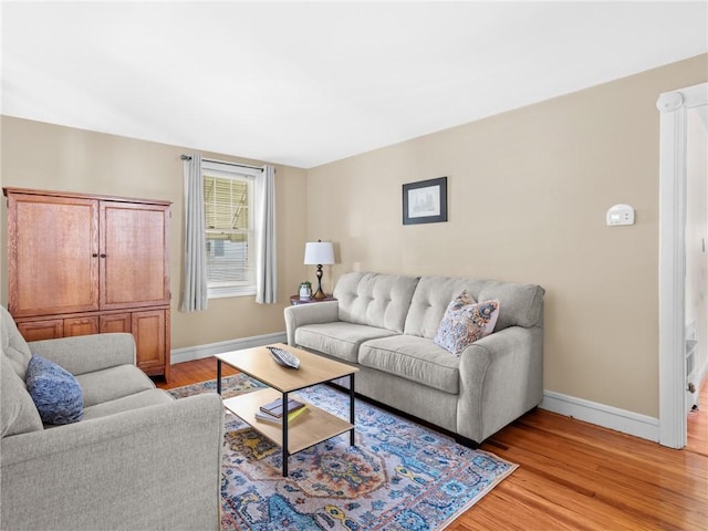 25 Community Rd, Warwick, RI 02889 - living area with baseboards and light wood finished floors