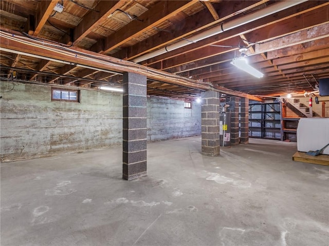25 Community Rd, Warwick, RI 02889 - unfinished basement featuring stairs and water heater