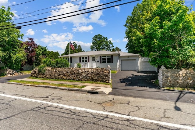21 High Service Ave, North Providence, RI 02911 - single story home featuring an attached garage and asphalt driveway