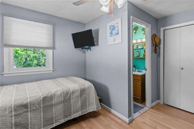 21 High Service Ave, North Providence, RI 02911 - bedroom featuring wood finished floors, baseboards, a ceiling fan, and a closet