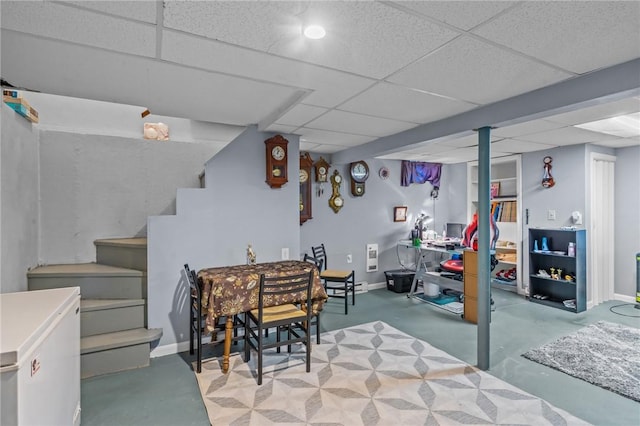 21 High Service Ave, North Providence, RI 02911 - finished below grade area featuring a paneled ceiling, stairs, refrigerator, and baseboards
