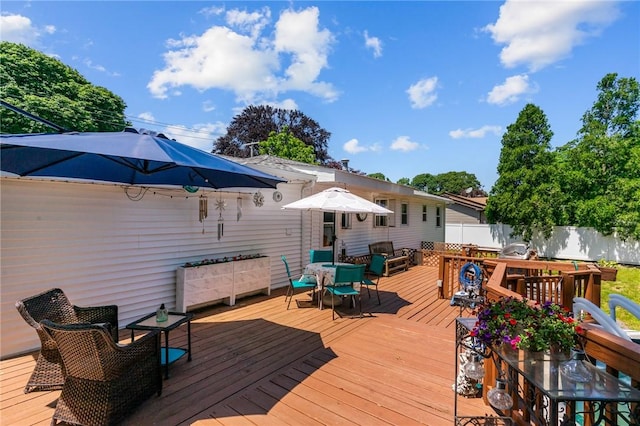 21 High Service Ave, North Providence, RI 02911 - deck with outdoor dining space and outdoor lounge area