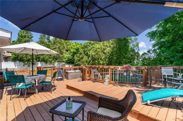 21 High Service Ave, North Providence, RI 02911 - wooden deck featuring outdoor dining area