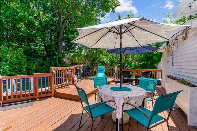 21 High Service Ave, North Providence, RI 02911 - wooden terrace with outdoor dining space