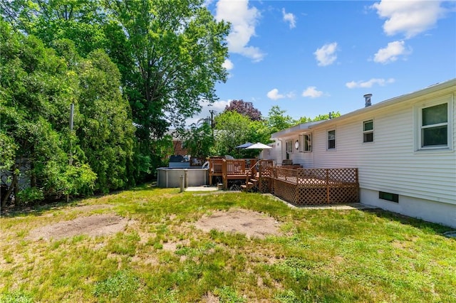 21 High Service Ave, North Providence, RI 02911 - view of grassy yard with a wooden deck