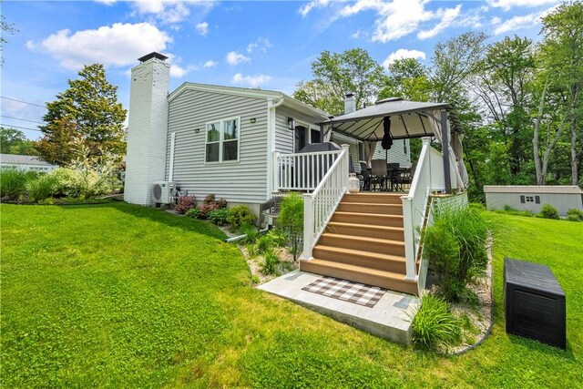 50 Maureen Dr, Smithfield, RI 02917 - back of house with a gazebo, a chimney, a yard, ac unit, and outdoor dining area