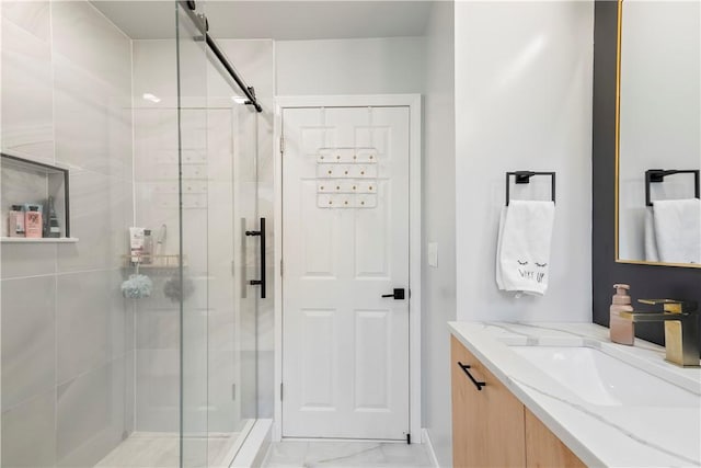 50 Maureen Dr, Smithfield, RI 02917 - full bath featuring a stall shower, vanity, marble look tiles, and baseboards