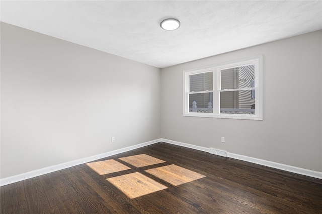 21 Victor Emanuel Ave, Providence, RI 02904 - empty room featuring baseboards and dark wood finished floors