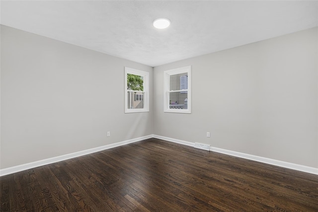 21 Victor Emanuel Ave, Providence, RI 02904 - empty room with baseboards and dark wood finished floors