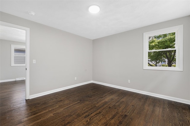 21 Victor Emanuel Ave, Providence, RI 02904 - unfurnished room with dark wood-style floors and baseboards