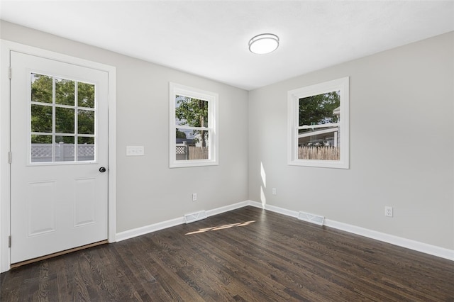 21 Victor Emanuel Ave, Providence, RI 02904 - empty room with healthy amount of natural light, dark wood finished floors, and baseboards