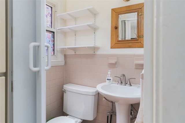 32 N Clarendon St, Cranston, RI 02910 - bathroom featuring tile walls, toilet, and a wainscoted wall