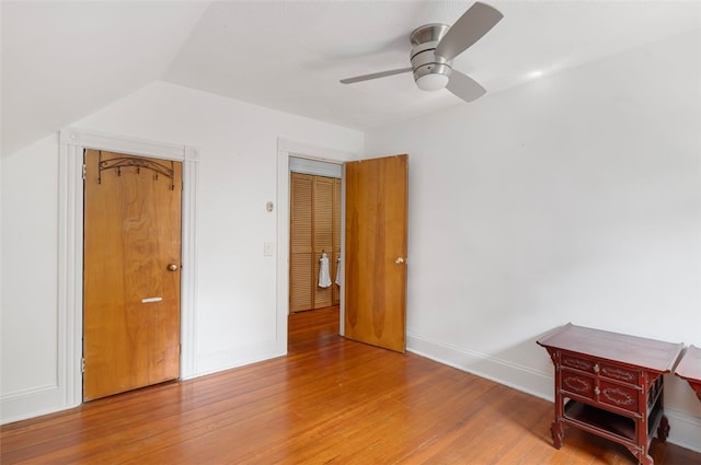 32 N Clarendon St, Cranston, RI 02910 - unfurnished bedroom featuring wood finished floors, vaulted ceiling, ceiling fan, and baseboards