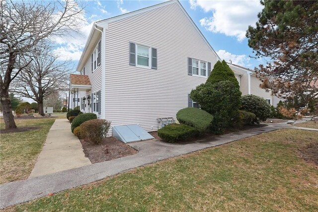 2970 Mendon Rd Unit 53, Cumberland, RI 02864 - view of property exterior featuring a lawn