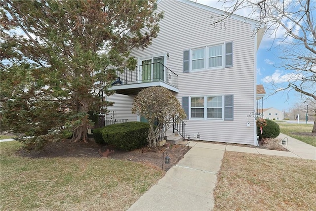 2970 Mendon Rd Unit 53, Cumberland, RI 02864 - view of front facade with a balcony and a front lawn