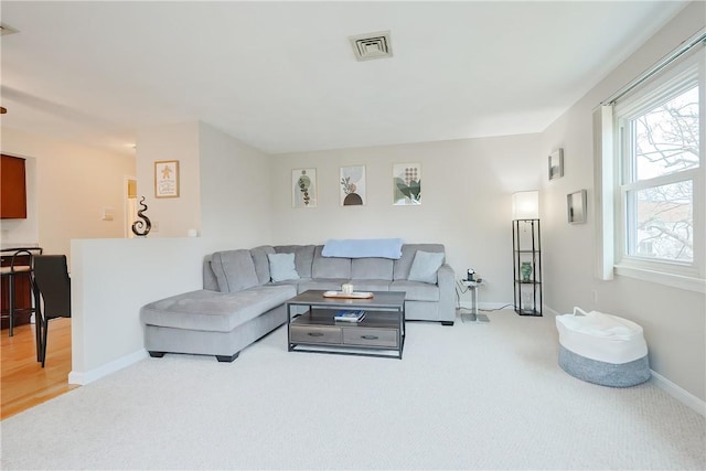 2970 Mendon Rd Unit 53, Cumberland, RI 02864 - carpeted living area featuring baseboards