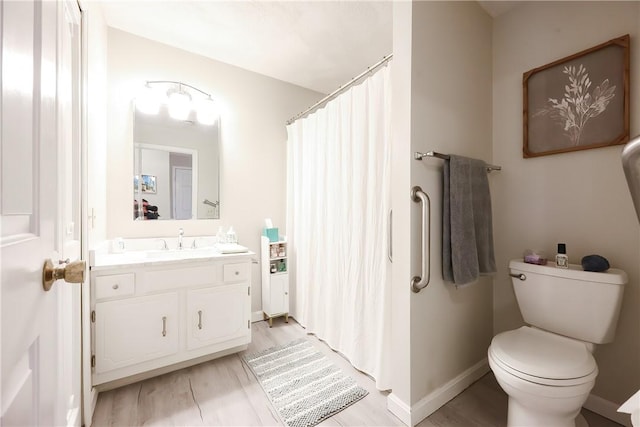 2970 Mendon Rd Unit 53, Cumberland, RI 02864 - bathroom with vanity, wood finished floors, toilet, and a shower with curtain