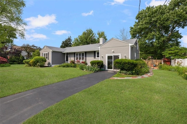 6 Humes Ave, Warwick, RI 02889 - ranch-style house featuring a front lawn and a chimney