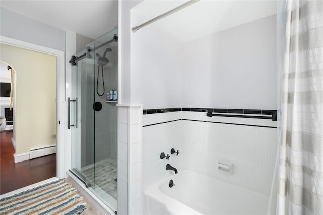 6 Humes Ave, Warwick, RI 02889 - full bath with a shower stall, a tub to relax in, a baseboard heating unit, wood finished floors, and wainscoting