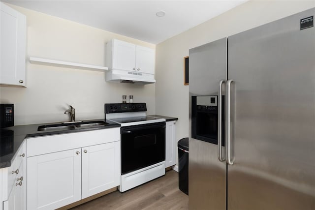 6 Humes Ave, Warwick, RI 02889 - kitchen featuring stainless steel fridge, electric range oven, under cabinet range hood, and white cabinets