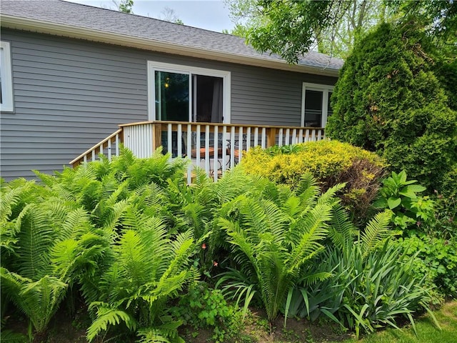 6 Humes Ave, Warwick, RI 02889 - view of side of property featuring roof with shingles