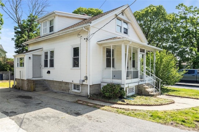 103 Henrietta St, Providence, RI 02904 - view of front of property with a porch
