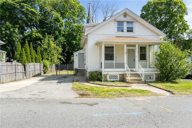 103 Henrietta St, Providence, RI 02904 - view of front facade with covered porch and driveway