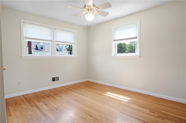 295 Chestnut St, Warwick, RI 02888 - spare room featuring light wood finished floors, baseboards, and ceiling fan