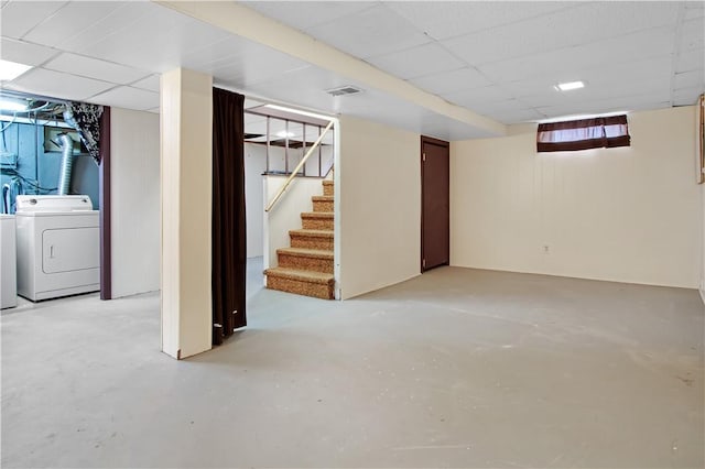 295 Chestnut St, Warwick, RI 02888 - basement featuring a drop ceiling, washing machine and clothes dryer, and stairs
