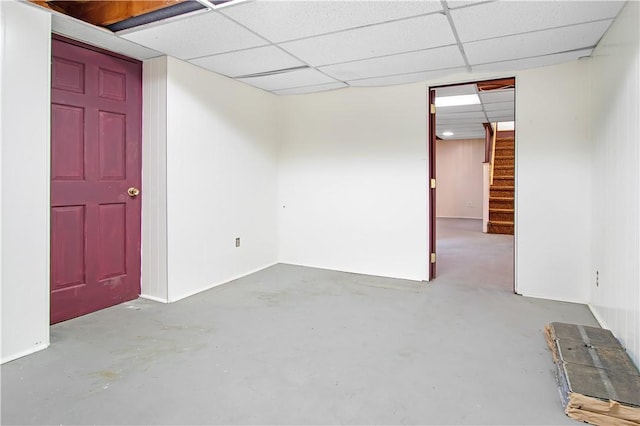 295 Chestnut St, Warwick, RI 02888 - unfurnished room featuring concrete flooring, stairway, and a paneled ceiling