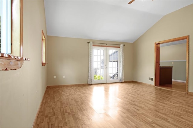 295 Chestnut St, Warwick, RI 02888 - unfurnished room with vaulted ceiling, light wood-style floors, a ceiling fan, and baseboards