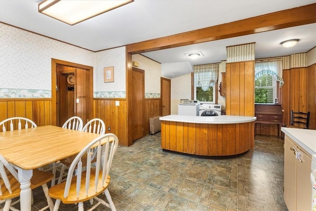 59 Woodland Rd, Woonsocket, RI 02895 - kitchen with wainscoting, washer and dryer, wallpapered walls, stone finish floors, and light countertops