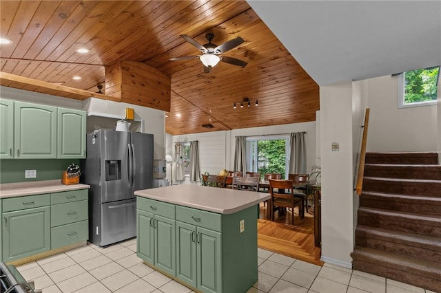 16 Spectacle Ave, Warwick, RI 02888 - kitchen with green cabinetry, stainless steel refrigerator with ice dispenser, wooden ceiling, plenty of natural light, and light tile patterned flooring