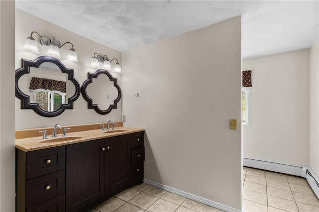 16 Spectacle Ave, Warwick, RI 02888 - full bath featuring tile patterned flooring, double vanity, a baseboard heating unit, and baseboards