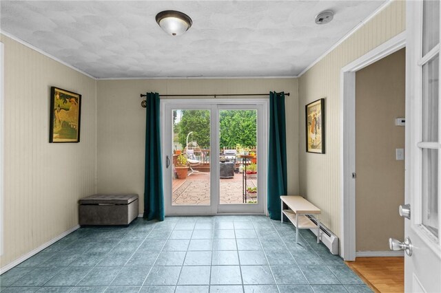 16 Spectacle Ave, Warwick, RI 02888 - entryway with ornamental molding, baseboards, and light tile patterned floors