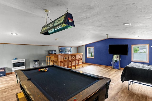 16 Spectacle Ave, Warwick, RI 02888 - recreation room with wood finished floors, heating unit, a bar, lofted ceiling, and pool table