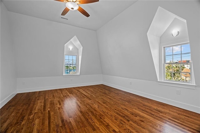 18 State St Unit 3E, Bristol, RI 02809 - bonus room featuring dark wood-style flooring, lofted ceiling, ceiling fan, and baseboards