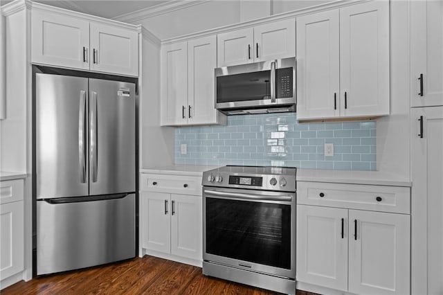 18 State St Unit 3E, Bristol, RI 02809 - kitchen with appliances with stainless steel finishes, light countertops, white cabinetry, and dark wood-style floors