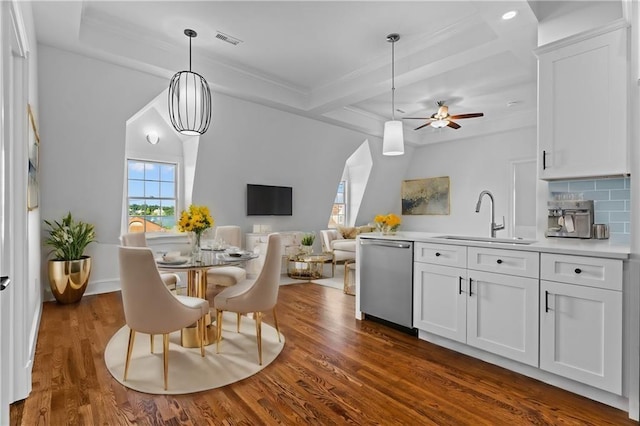 18 State St Unit 3E, Bristol, RI 02809 - dining space featuring dark wood-style floors, a ceiling fan, and crown molding