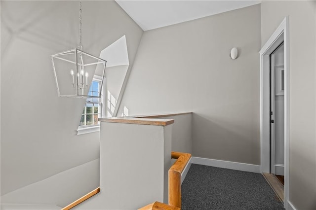 18 State St Unit 3E, Bristol, RI 02809 - hall featuring an upstairs landing, a chandelier, and baseboards