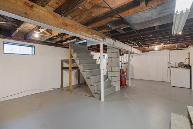 126 Weaver Hill Rd, West Greenwich, RI 02817 - basement with washer / clothes dryer, stairway, and gas water heater