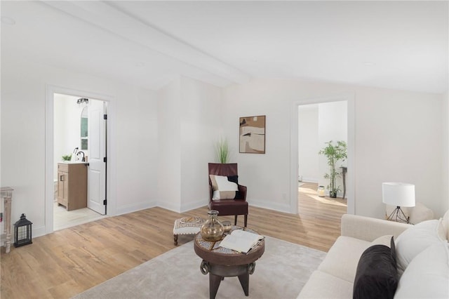 126 Weaver Hill Rd, West Greenwich, RI 02817 - living area with light wood finished floors and baseboards