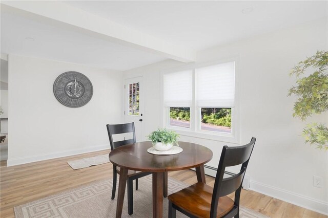 126 Weaver Hill Rd, West Greenwich, RI 02817 - dining room featuring baseboards and light wood finished floors