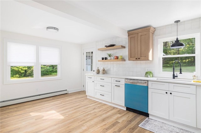 126 Weaver Hill Rd, West Greenwich, RI 02817 - kitchen featuring dishwasher, a sink, a baseboard heating unit, light countertops, and tasteful backsplash