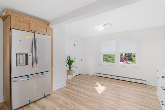 126 Weaver Hill Rd, West Greenwich, RI 02817 - kitchen with stainless steel fridge, baseboard heating, light wood-style floors, and baseboards