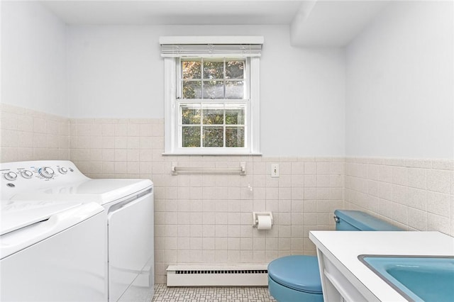 11 Crosswynds Dr, Narragansett, RI 02874 - bathroom featuring a baseboard radiator, washer and clothes dryer, tile walls, toilet, and vanity