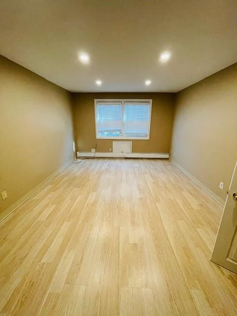 29 Woodbine St Unit 5, Pawtucket, RI 02860 - spare room featuring light wood finished floors, recessed lighting, and baseboards